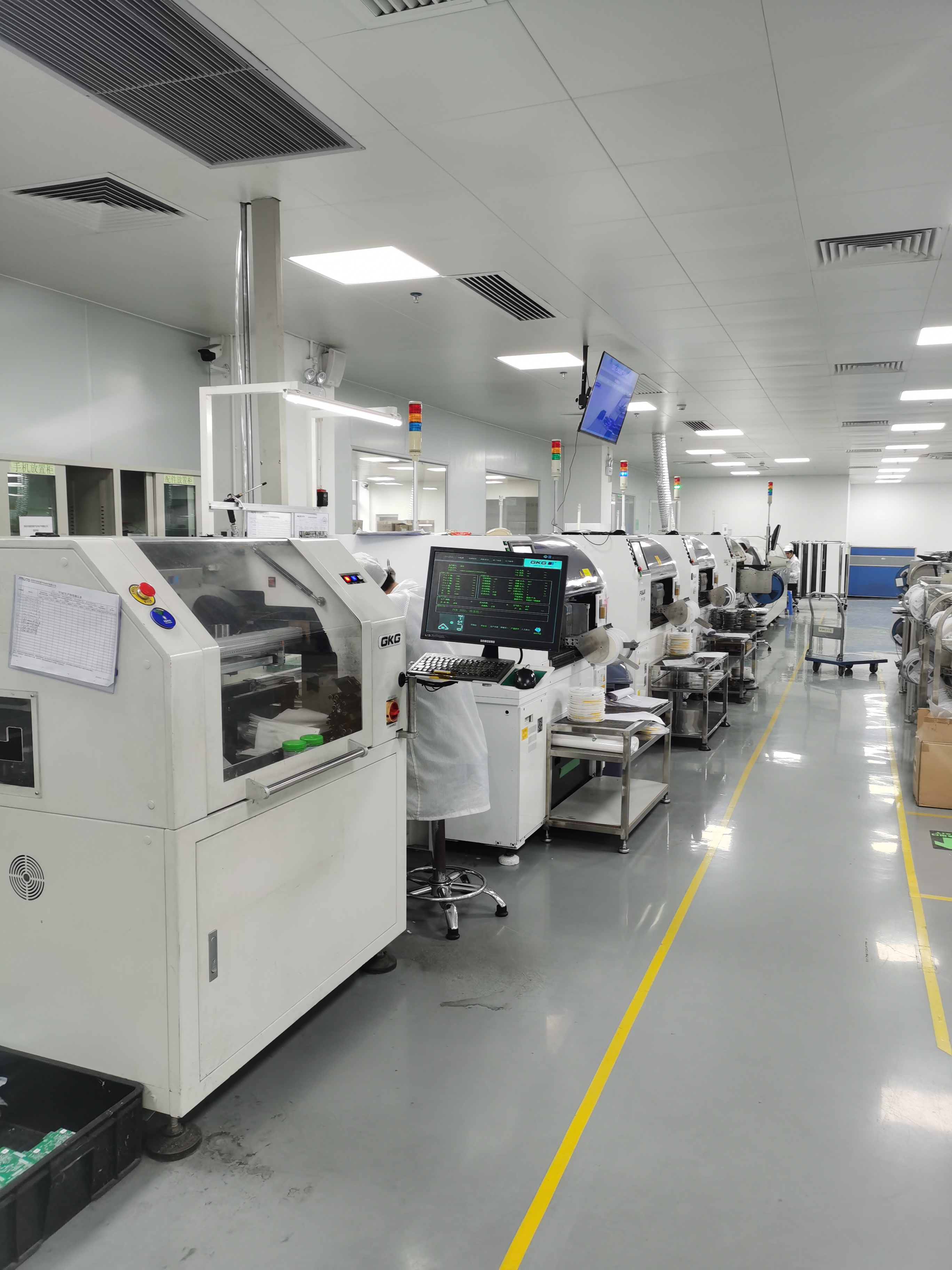SMT (Surface Mount Technology) production line in an electronics factory