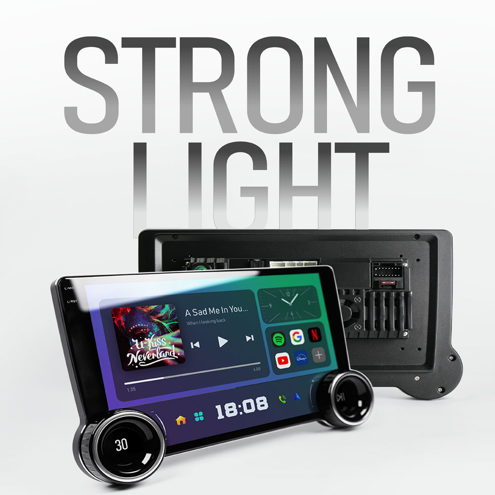 Modern touch screen car radio with dual knobs installed in a vehicle dashboard