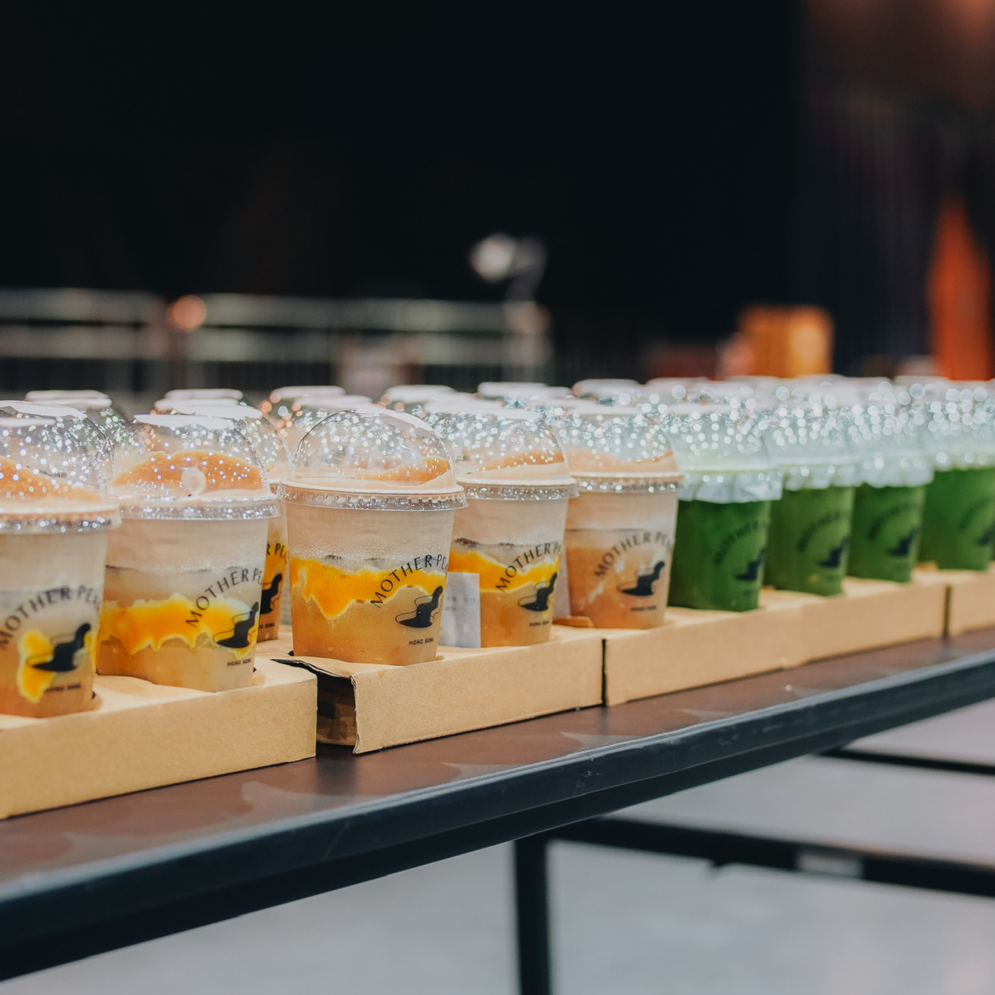 Employees enjoying Mother Pearl drinks