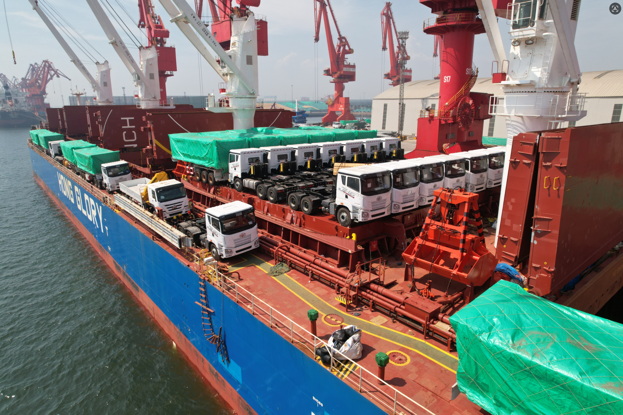 FAW trucks staged for loading and logistics fleet deployment