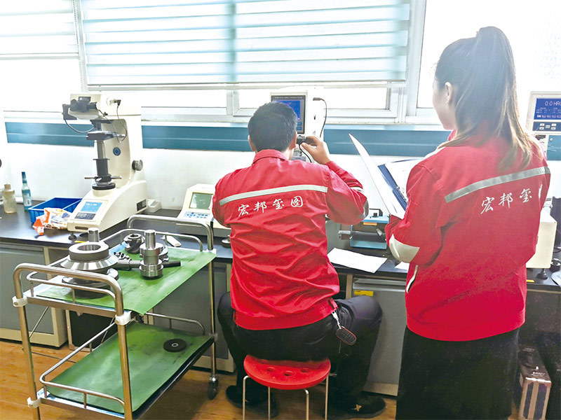 HONEPAN quality inspector conducting hardness testing on cam working face