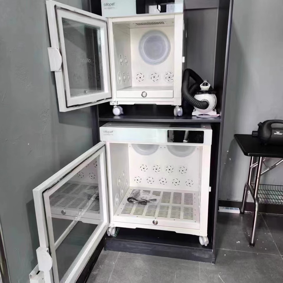 Pet drying cabinet in use at a salon
