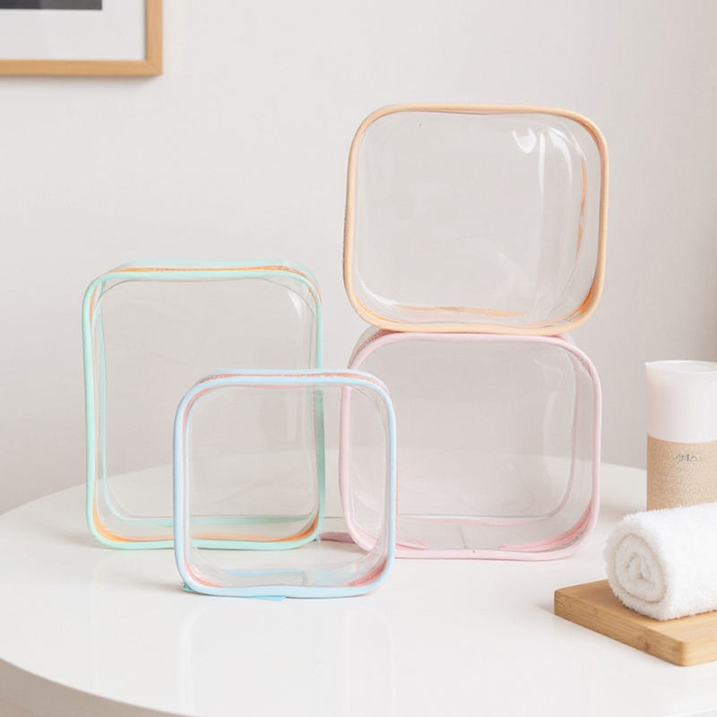 Group shot of clear PVC cosmetic pouches with colourful frames for multi-SKU promotional gift programmes