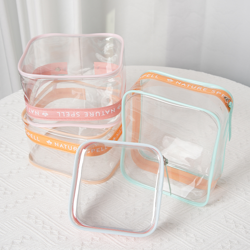 Clear PVC cosmetic pouches with colorful borders for wholesale programs