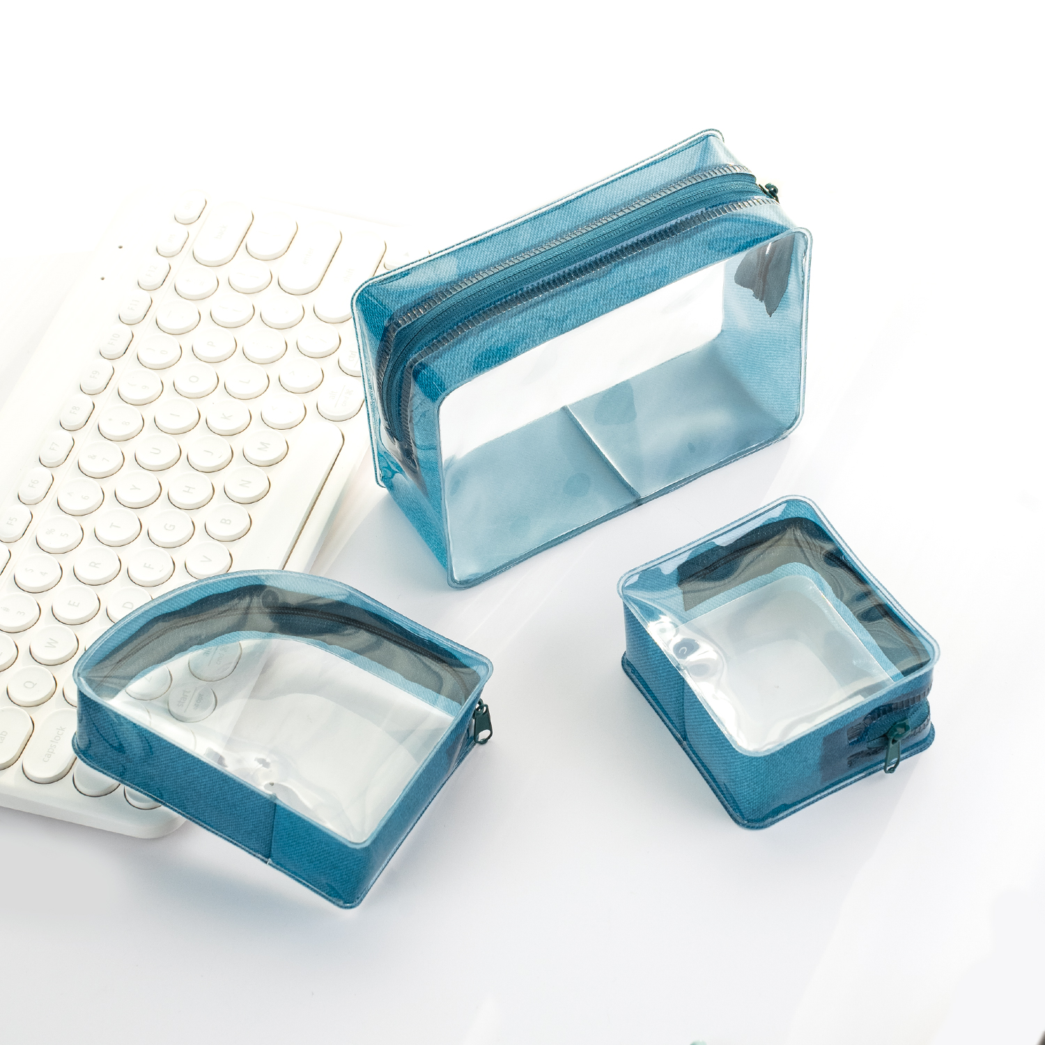 Dark blue transparent PVC cosmetic pouches with zipper closure and clear view