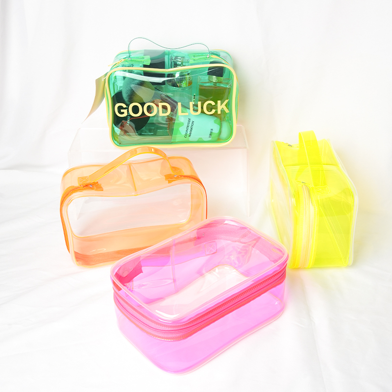 Four-color set of Hansun PVC display bags with portable designs and zipper closure