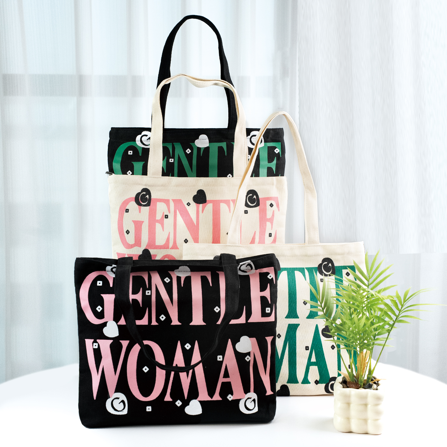 Black canvas tote bag with GENTLE WOMAN print