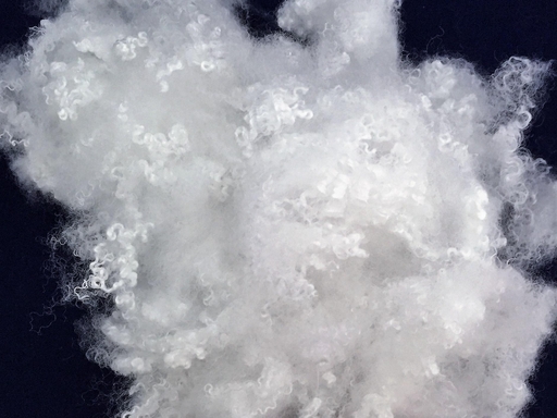 By-Herb fiber derived from medicinal herbs, shown as natural beige staple fiber