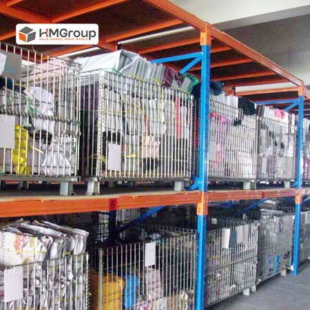 Industrial stackable wire containers in warehouse