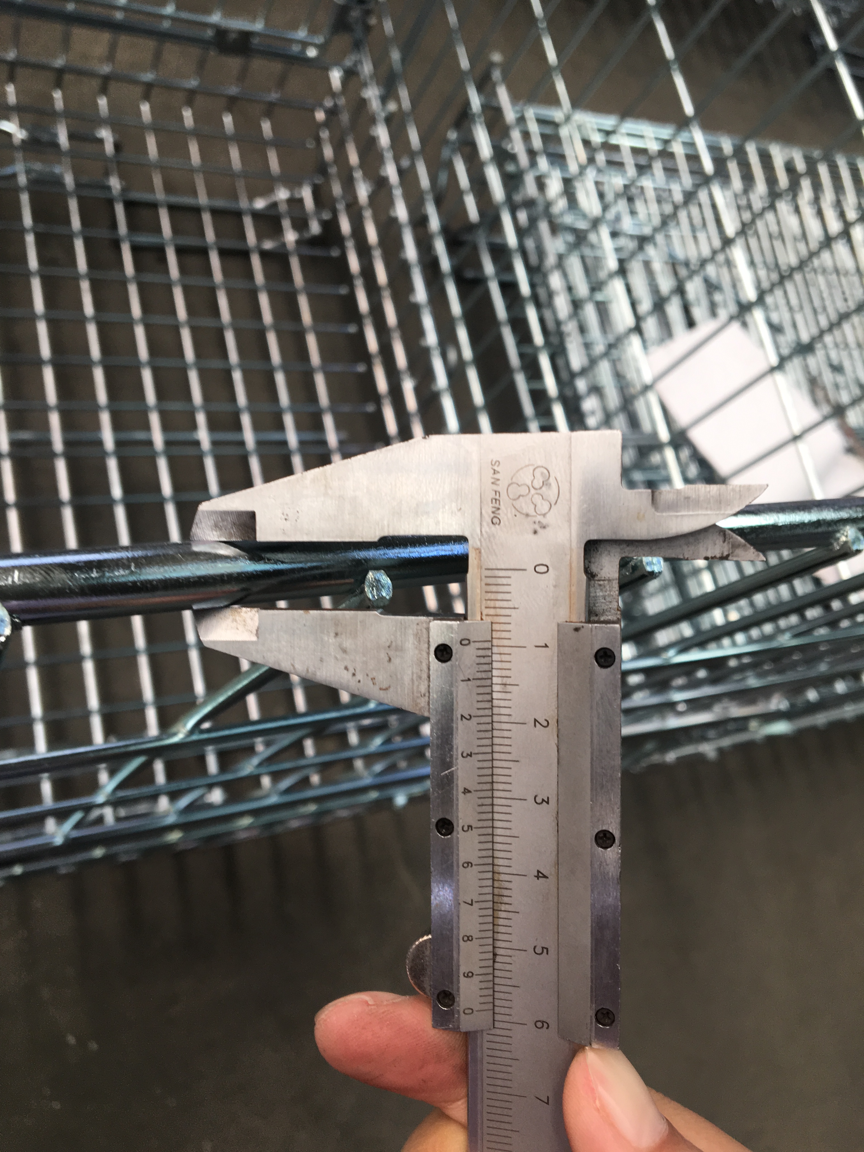Finished wire container wire diameter measurement verifying specification continuity for repeat orders