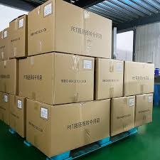 Corrugated carton box used for PET preform bottle storage, showing mismatched packaging for preforms
