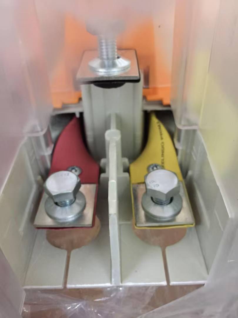 Heat-shrink tube insulation applied to a copper pan assembly busbar