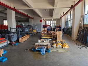 Modern manufacturing workshop, equipped with complete processing and assembly lines for packaging machinery.

