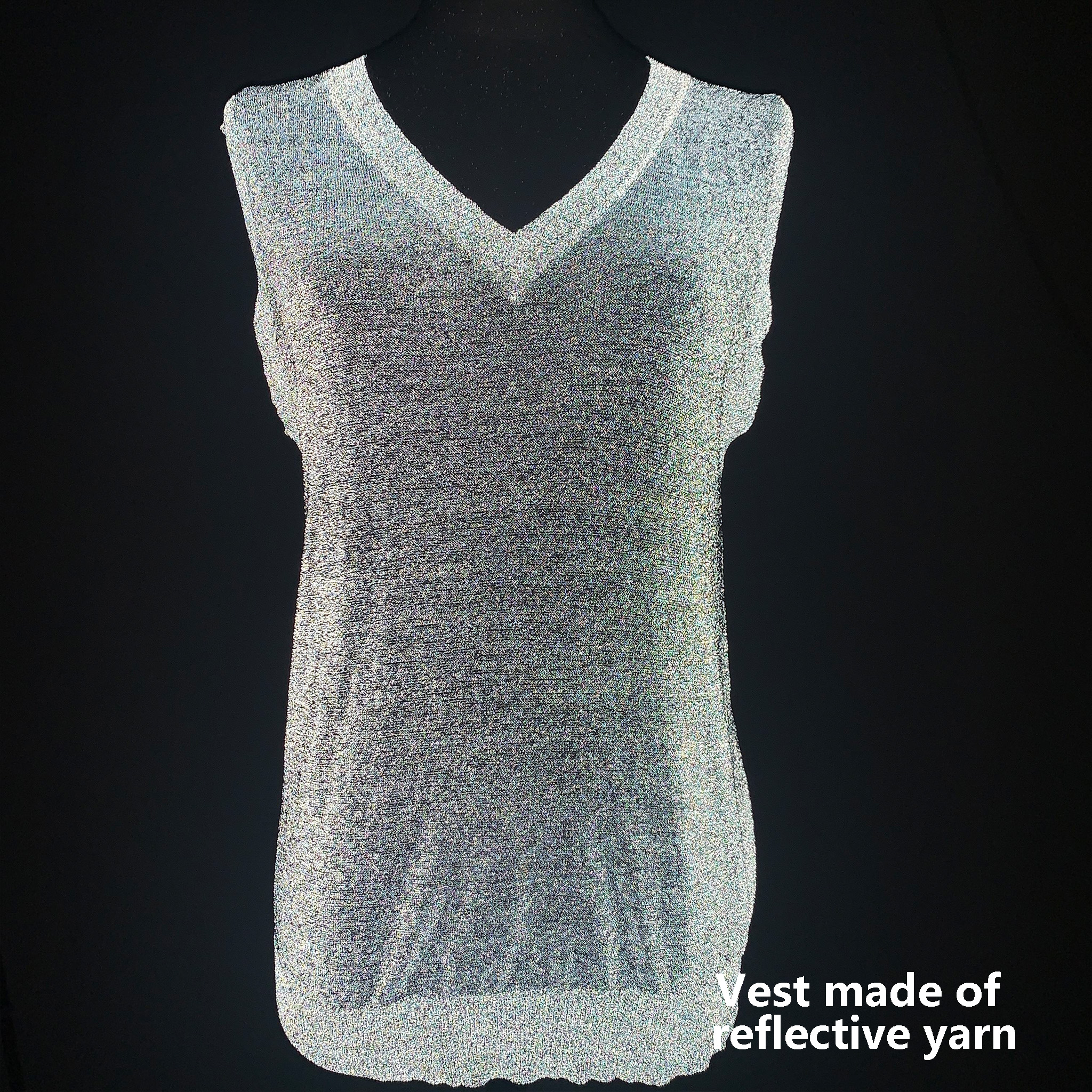 Safety vest made with reflective yarn, providing retroreflective visibility in low light