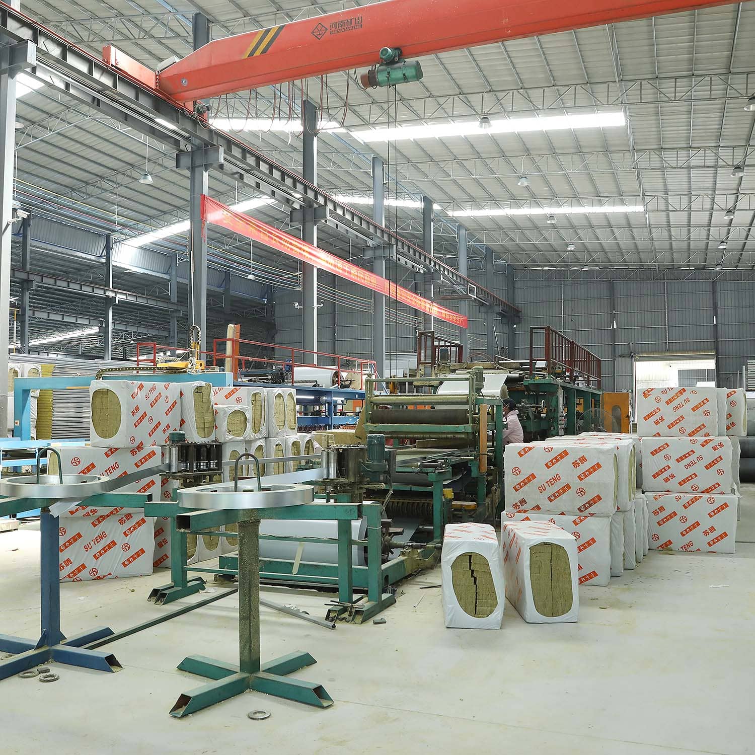 Sandwich panel production machine used to manufacture insulated panels for prefabricated steel garages and sheds