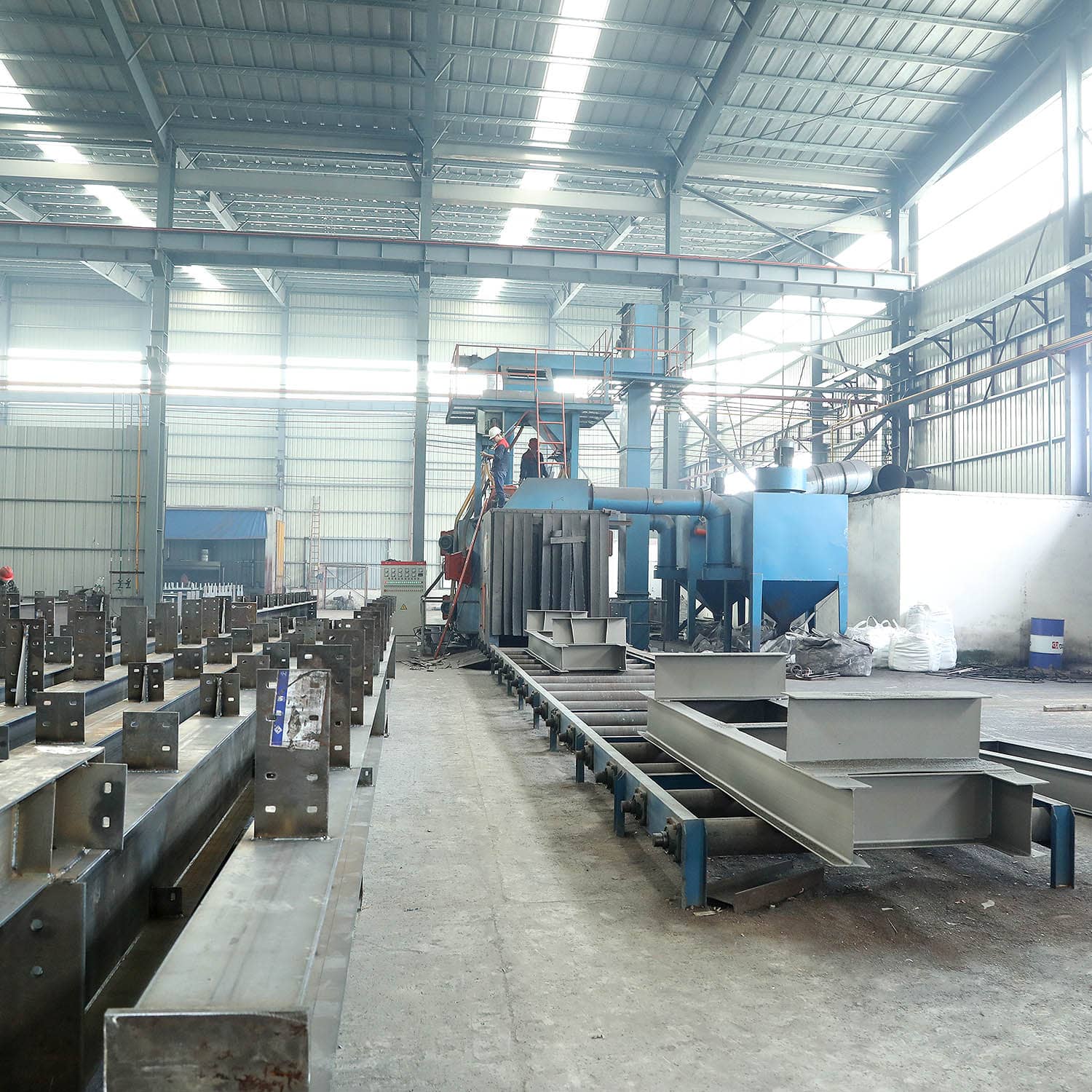 Shot blasting and multi‑layer anti‑corrosion processing at Ganyo factory