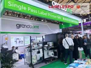 Grandoprint booth at Labelexpo Asia, showing Grando digital label printer exhibition display, customer visit and on-site machine demonstration for overseas label printing buyers