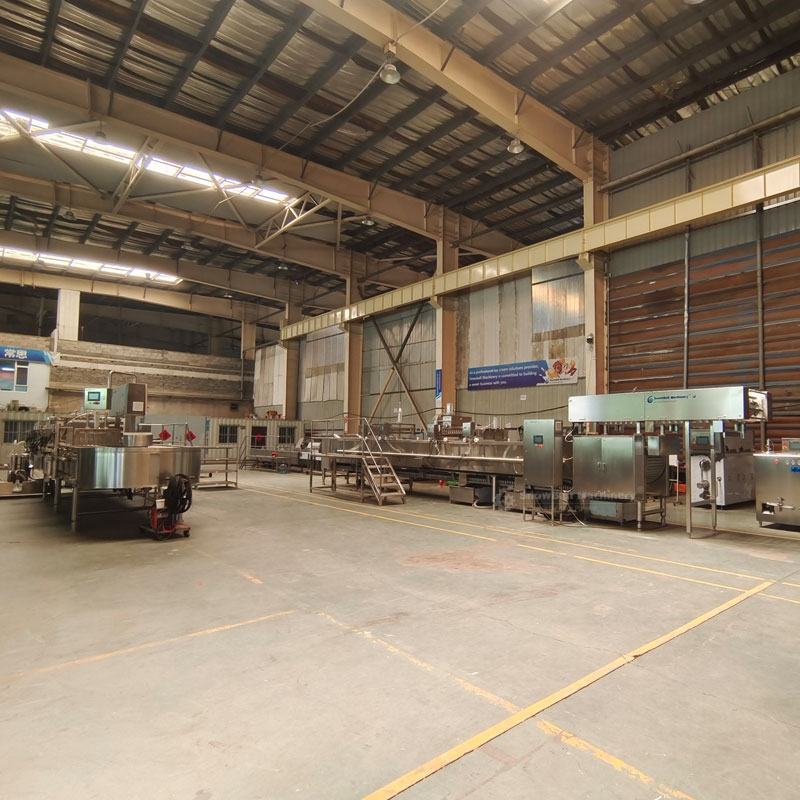Snowball Machinery assembly workshop showing industrial ice cream machine production