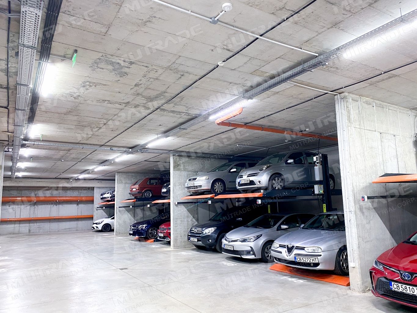 Two-level parking lift installed in a completed project