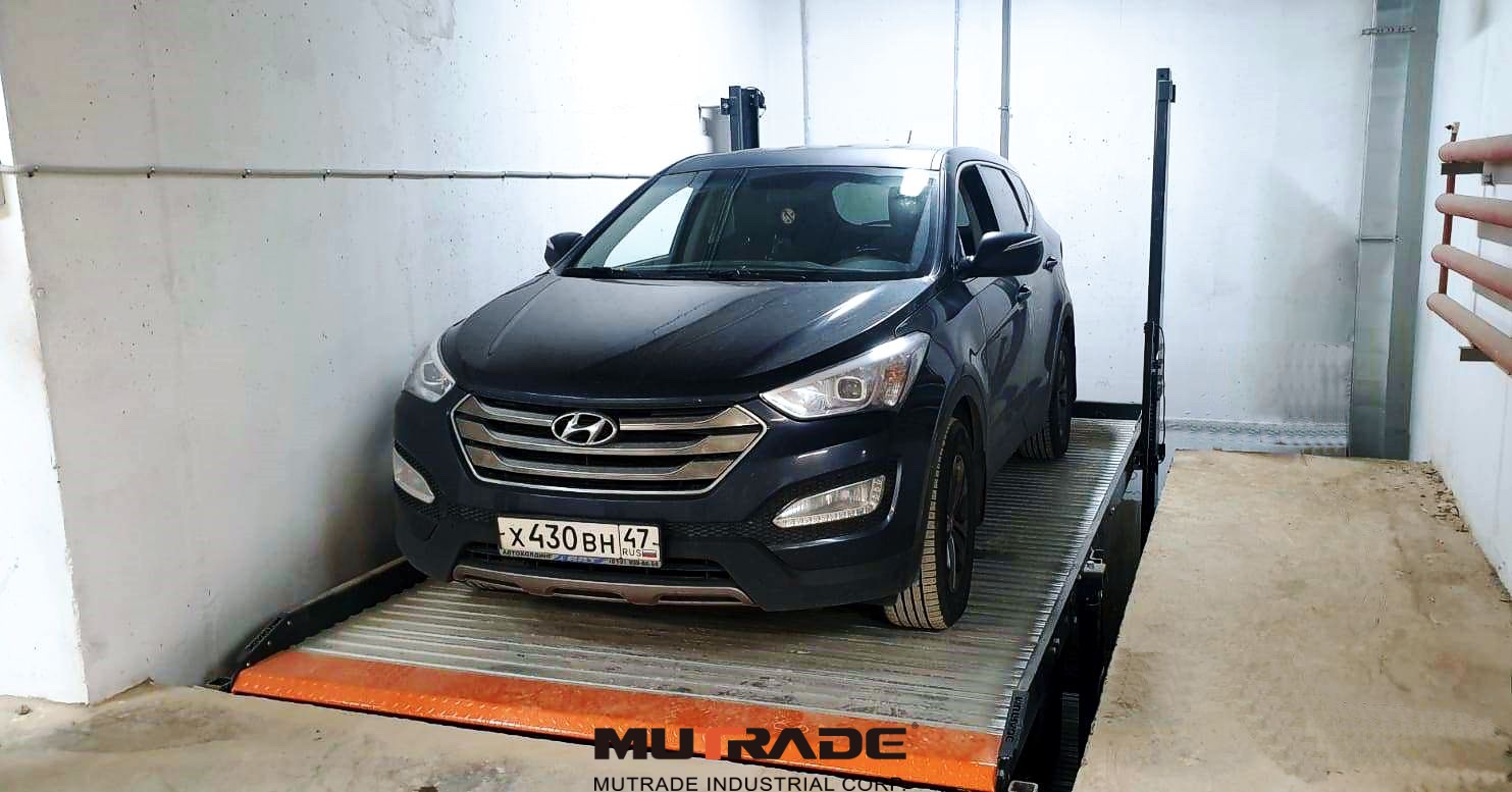 Starke 2127 pit parking lift providing independent access to the upper vehicle without moving the lower car