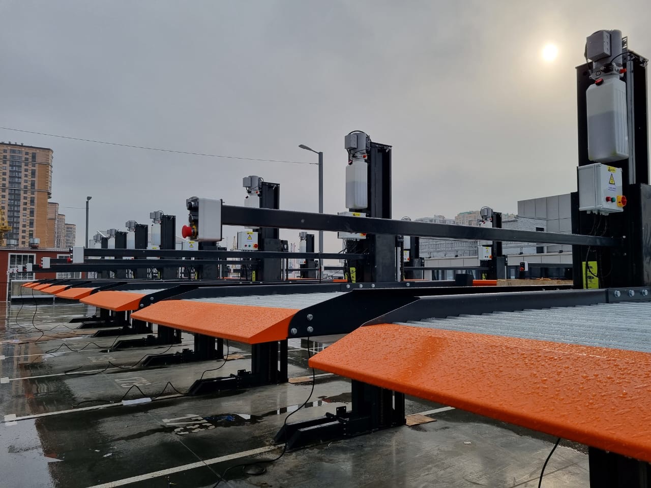 Hydro-Park 1127 two-post dependent parking lift with 2700 kg capacity and space-saving column design available for sample order and project quotation
