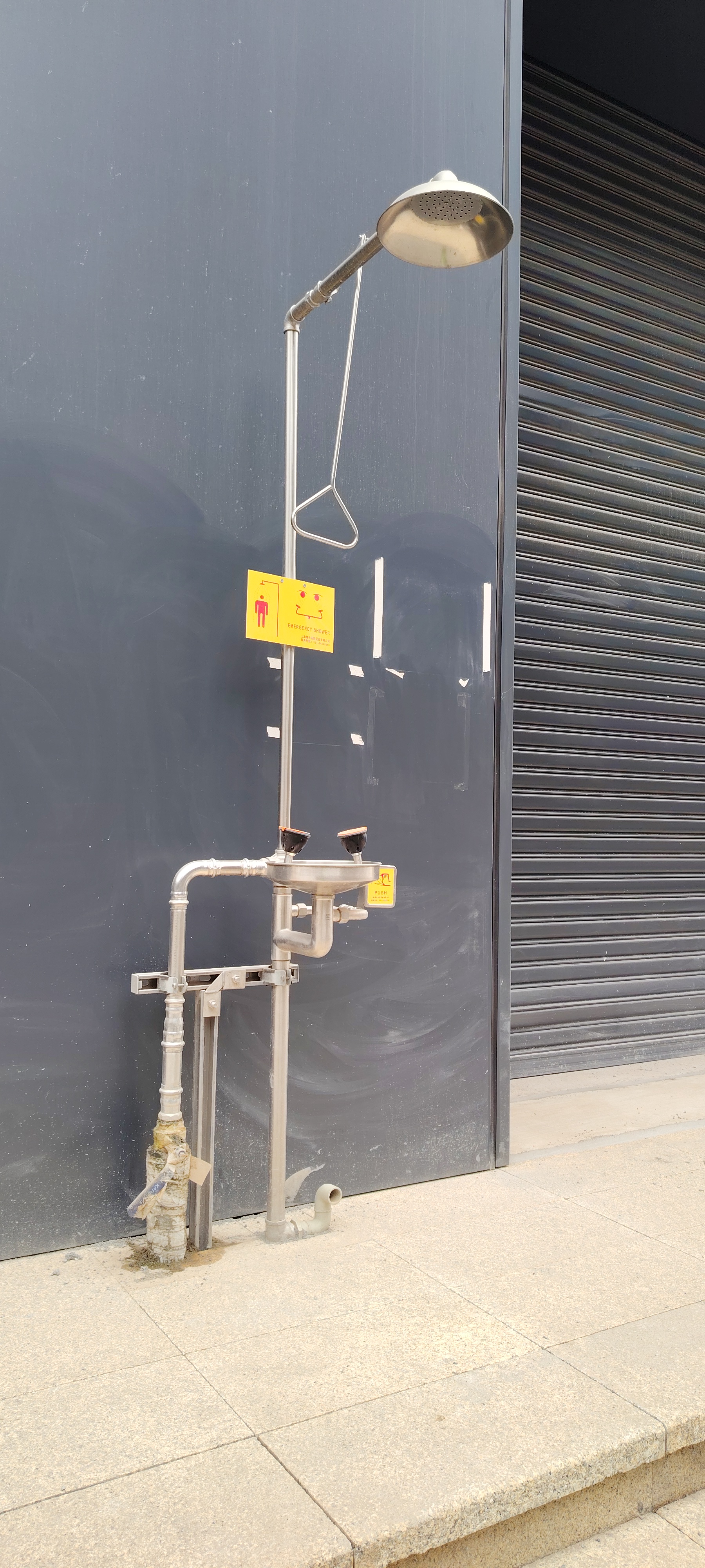 Emergency eyewash station deployed in an industrial environment