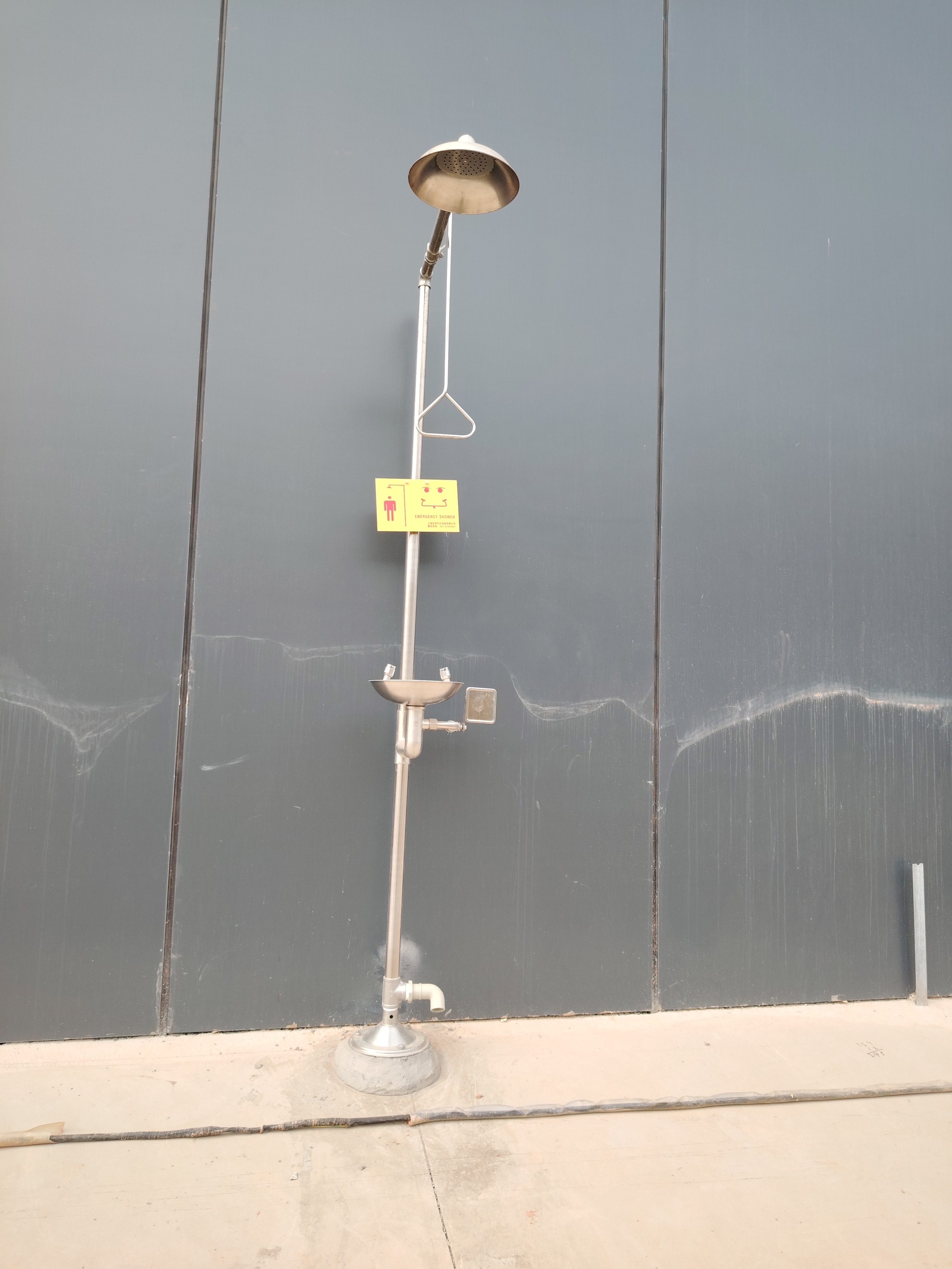 Compound emergency shower and eyewash installed in a chemical plant