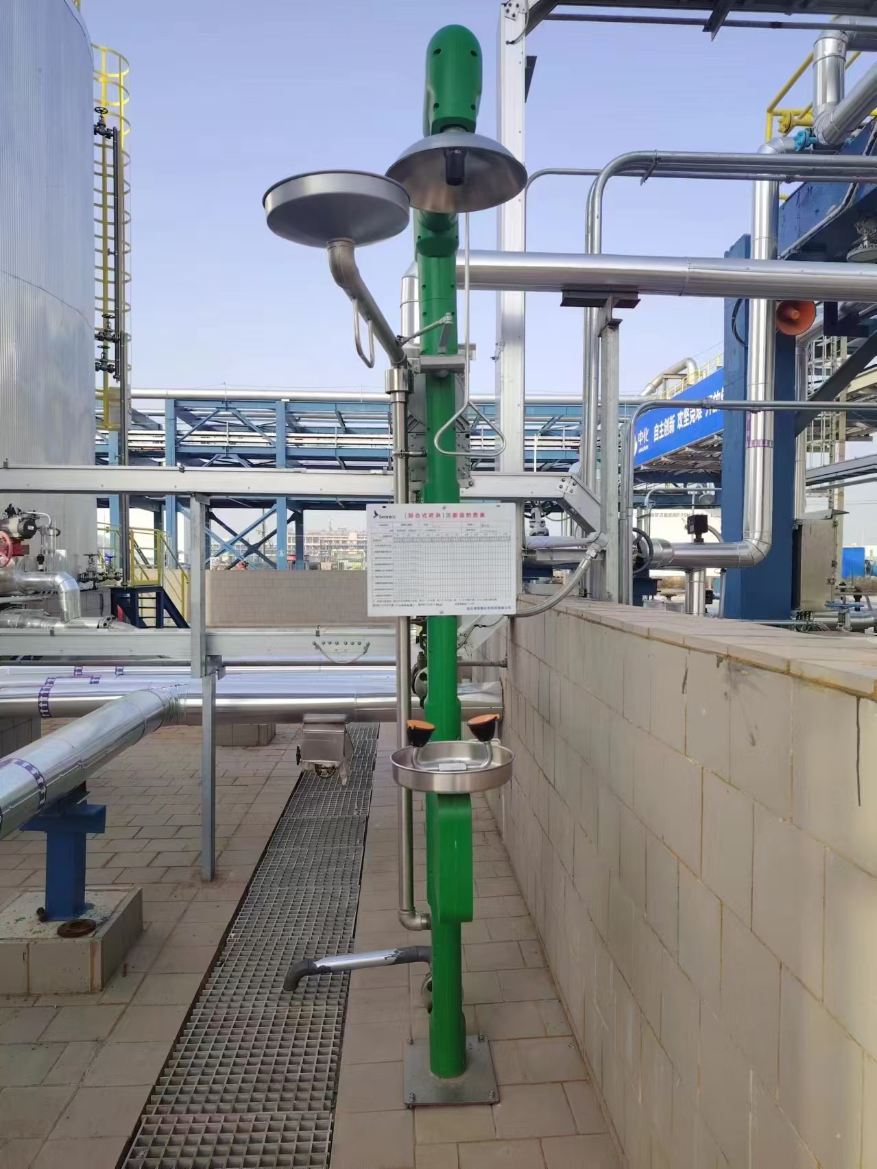 Electric heat tracing emergency shower and eyewash in industrial setting