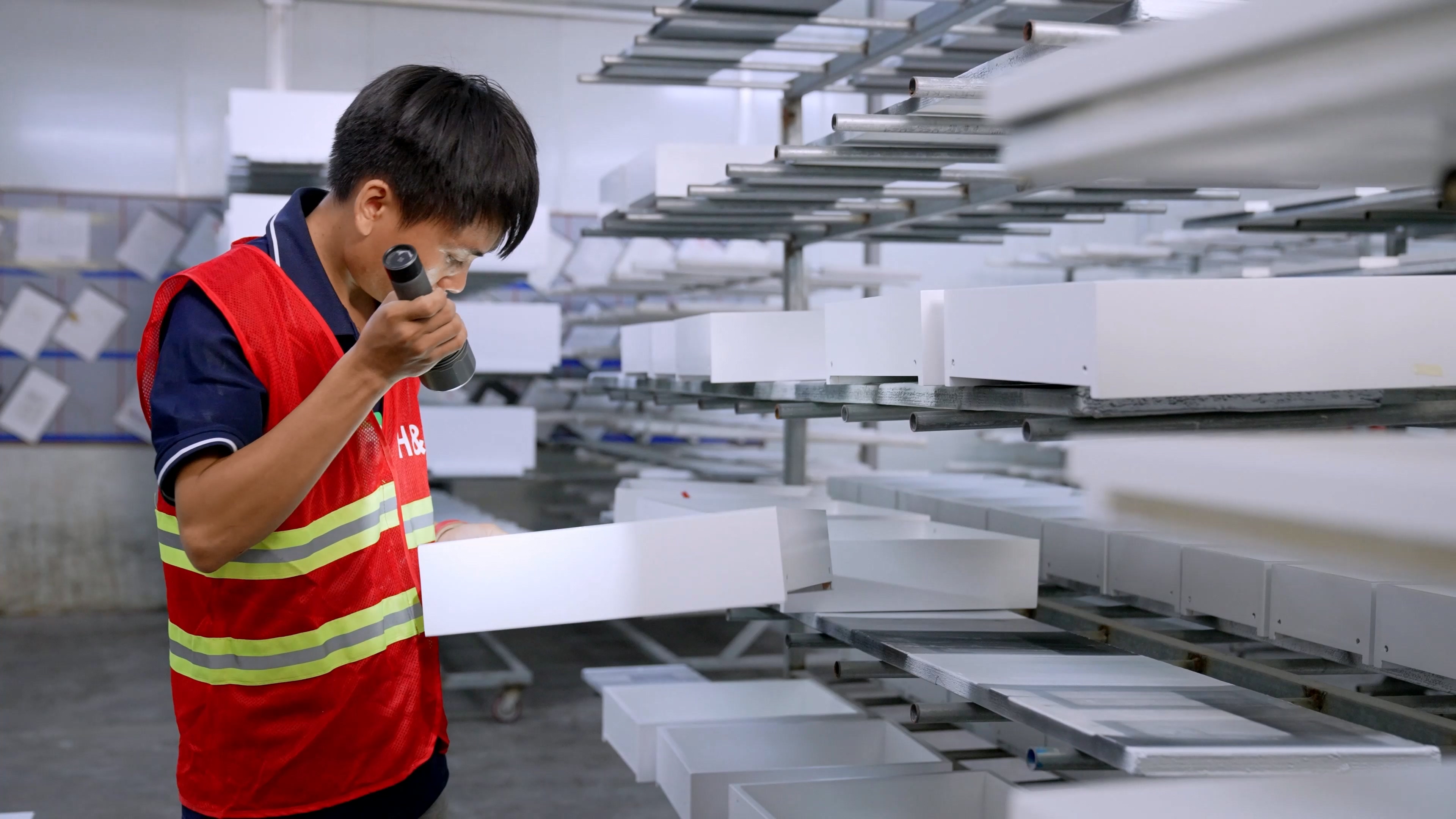 Quality inspector performing checks in SHKL laboratory
