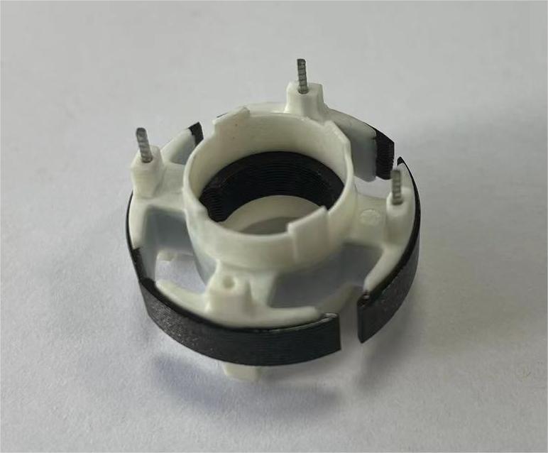 One-piece formed iron core with black electrophoretic coating