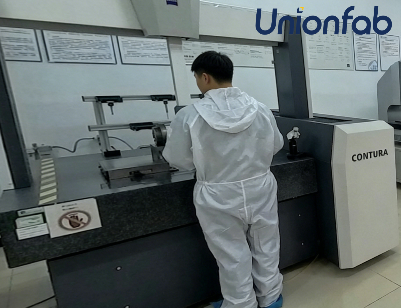 Unionfab quality inspector using micrometer on CNC machined part