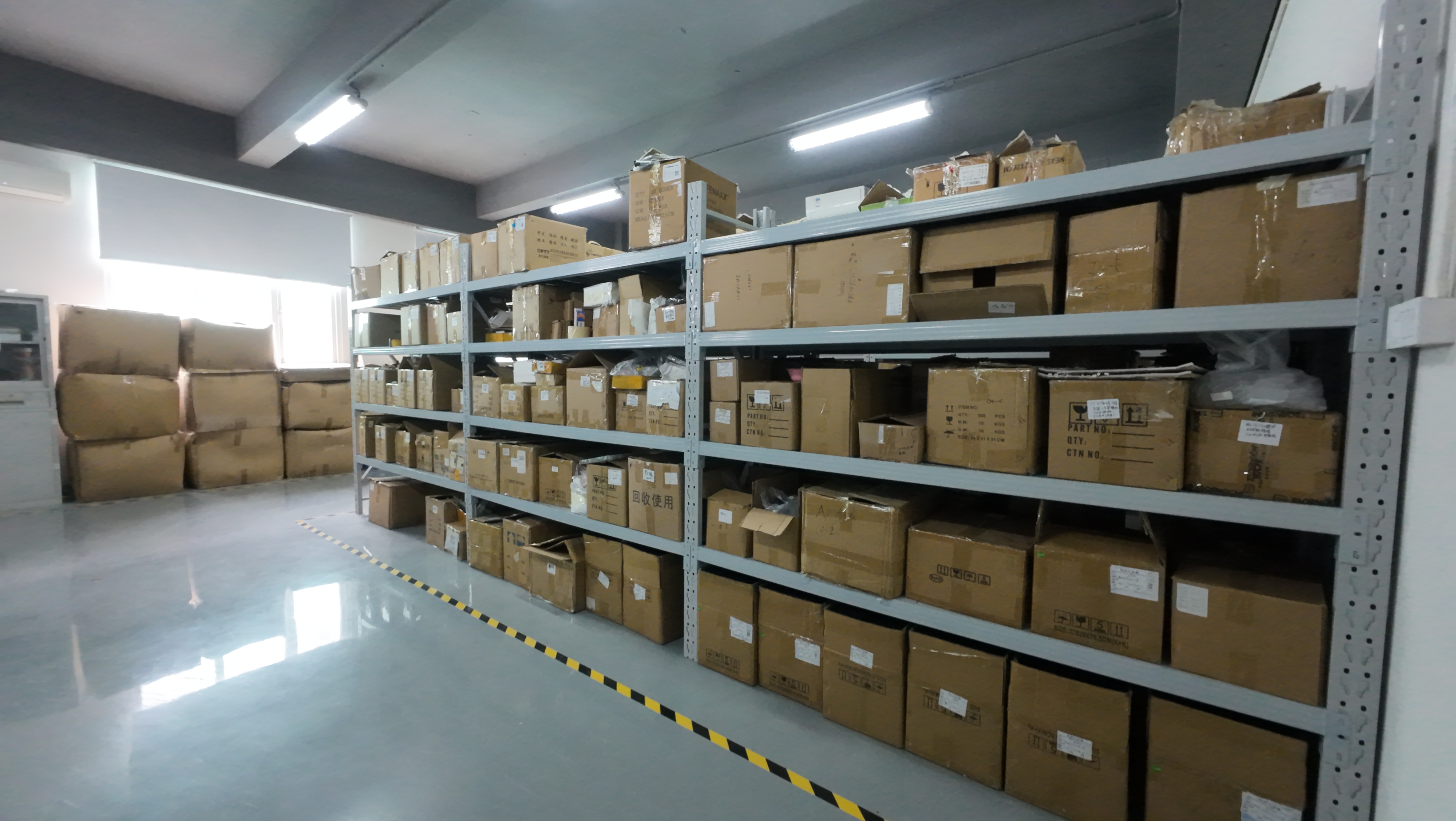 Warehouse holding high precision GNSS RTK receivers, RTK modules and GNSS antennas ready for export