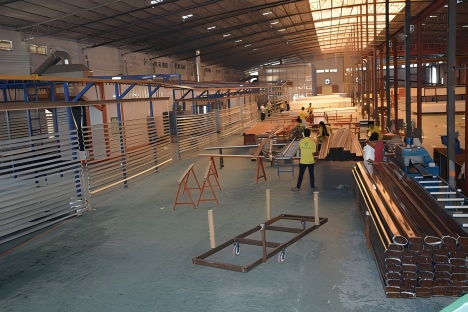 Nanbeiwang Aluminum production workshop with automated honeycomb panel manufacturing line
