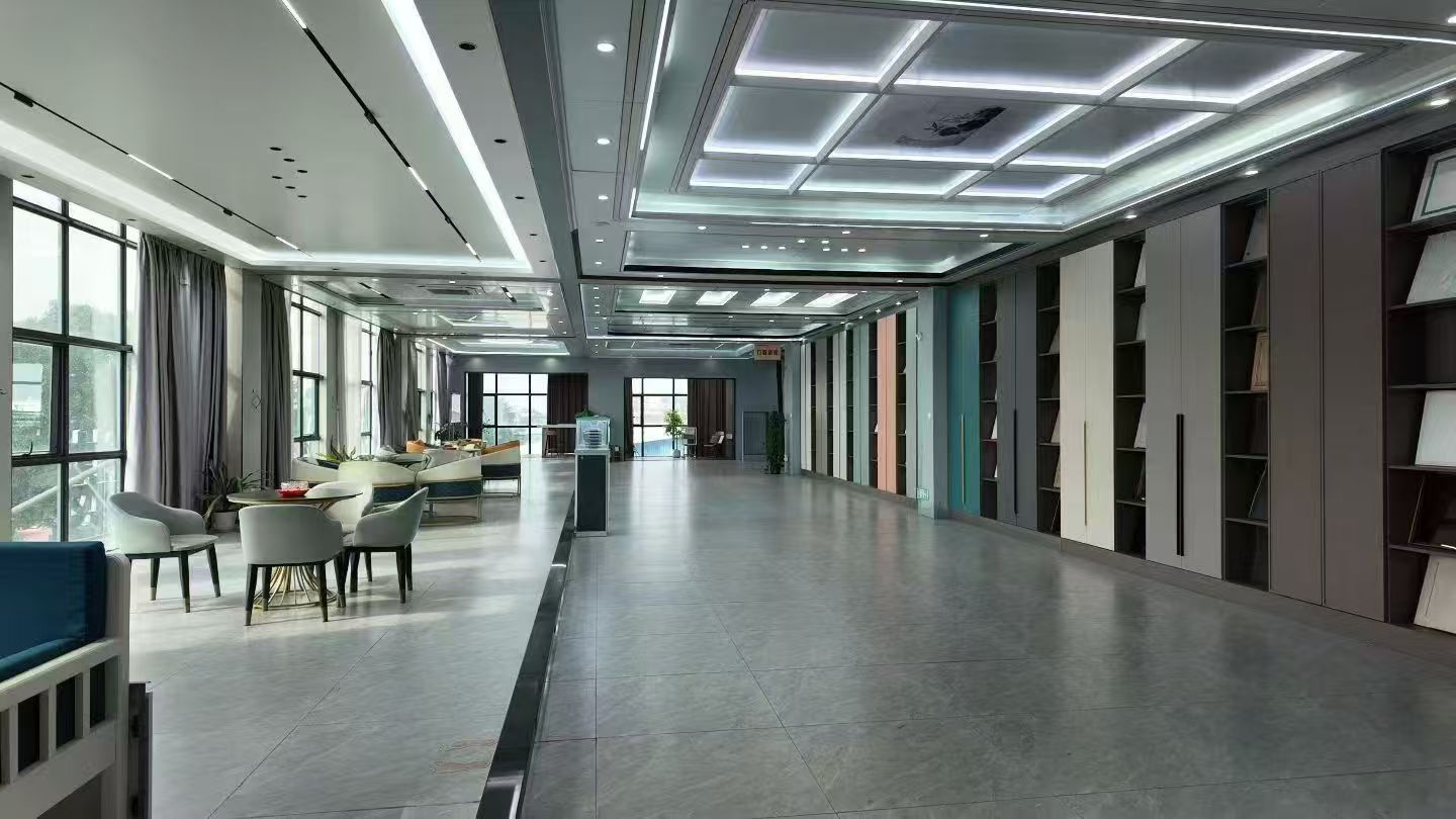 Exhibition area of Nanbeiwang Aluminum showing all-aluminum honeycomb panel applications for cabinets, wall panels and interior doors