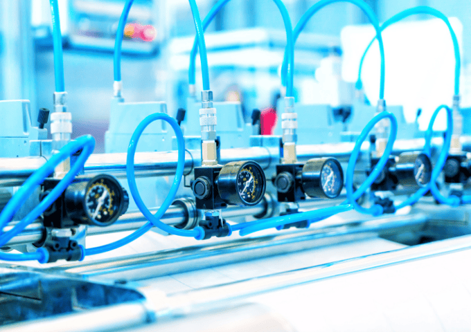 Industrial automation and semiconductor wet processing fluid line where clamp-on ultrasonic flow sensors monitor small-bore chemistry and cooling circuits
