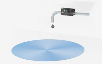 Clamp-on ultrasonic flow sensor installed on a coating process line
