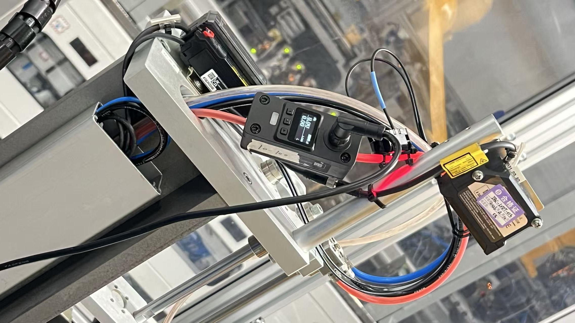 CPD series clamp-on ultrasonic flow sensor installed in industrial automation equipment