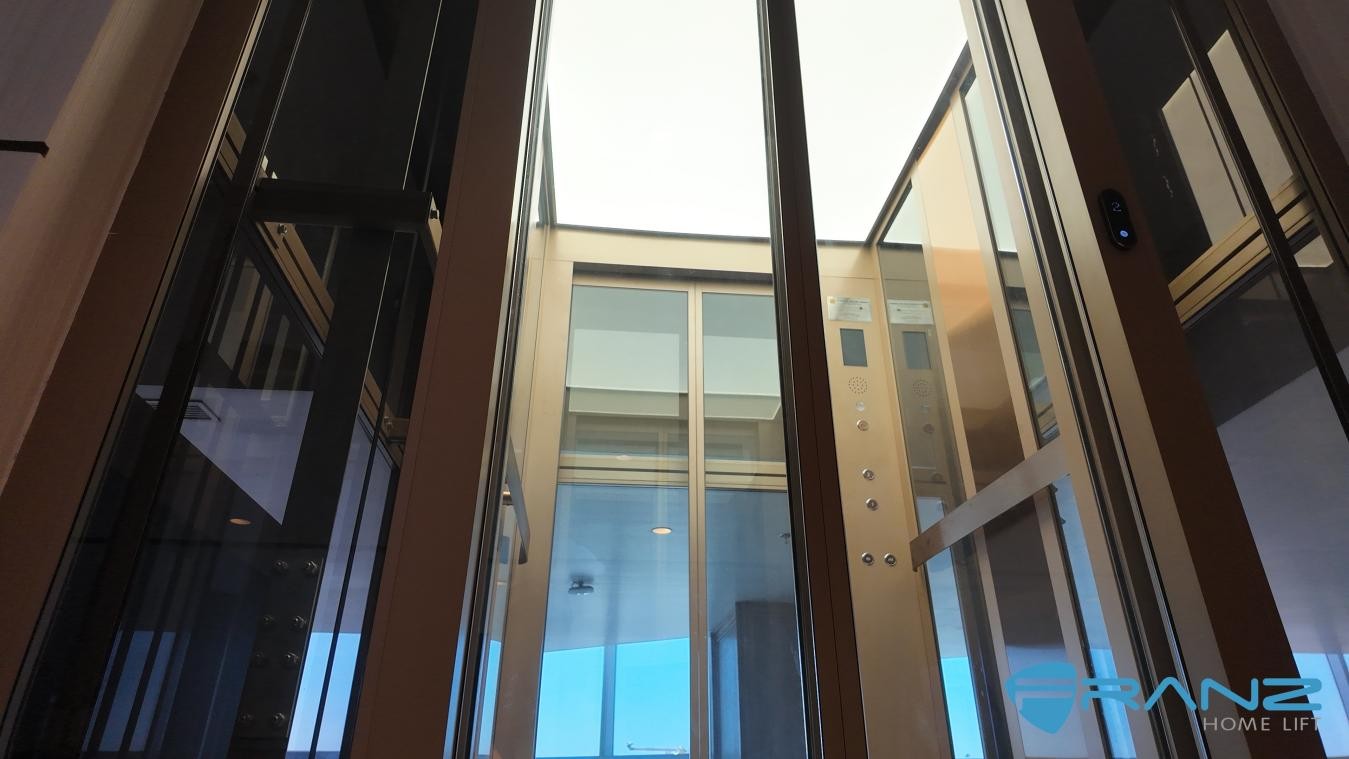 Glass lift cabin serving a luxury hotel passenger transportation project