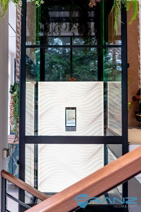 Home lift comparison guide cover showing an FRANZ platform lift installed in a residential setting