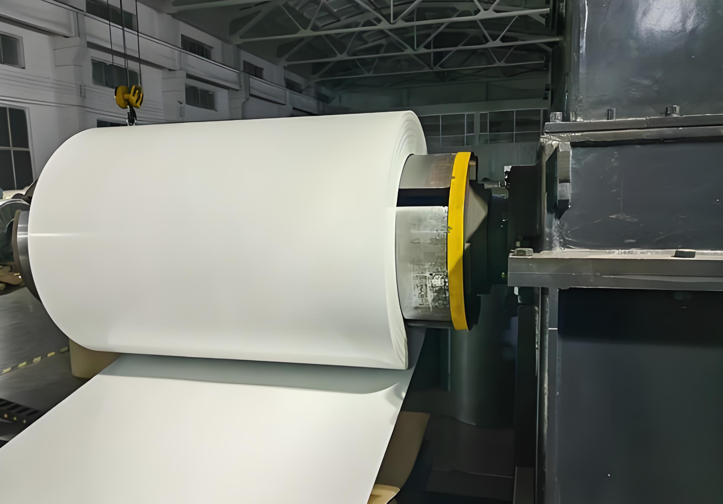 Glossy laminated stainless steel sheet with reflective surface