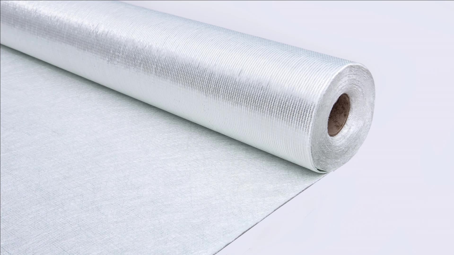 Fiberglass fabric installation in composite manufacturing