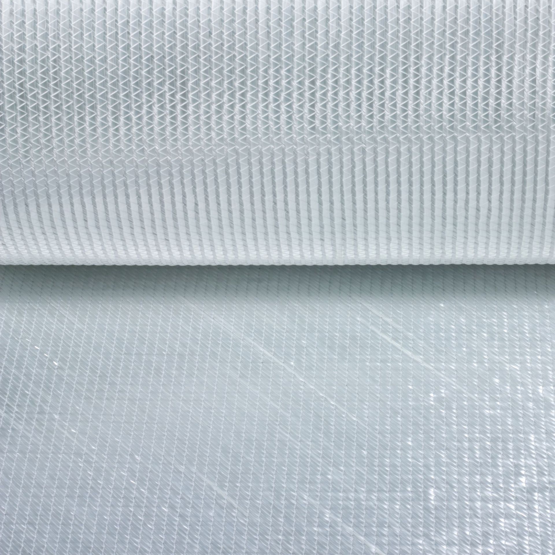 Structural composite reinforcement using multiaxial fiberglass fabric for marine, wind energy, and transportation applications