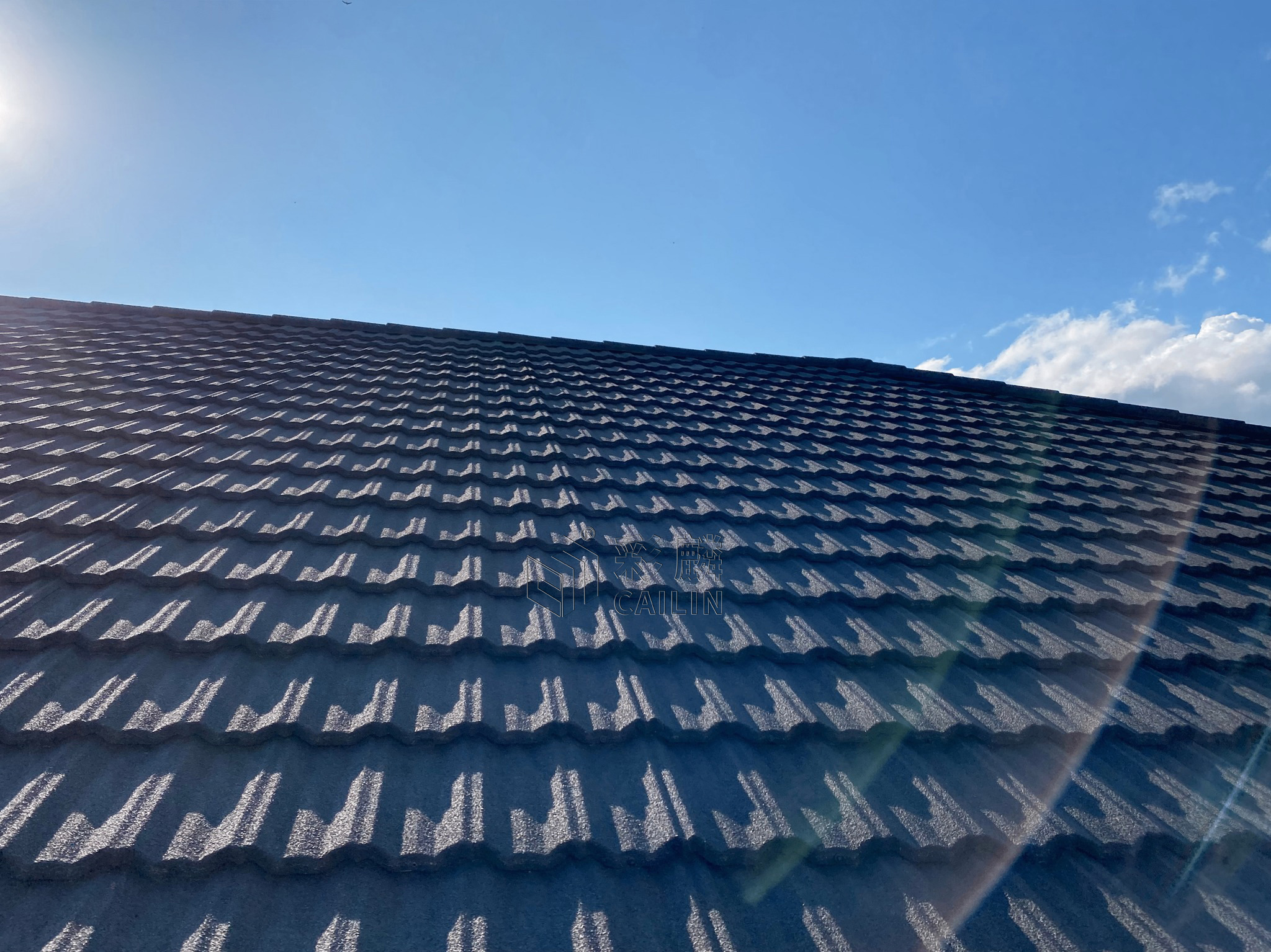 Stone coated metal roof on a residential villa in a hot, sunny climate