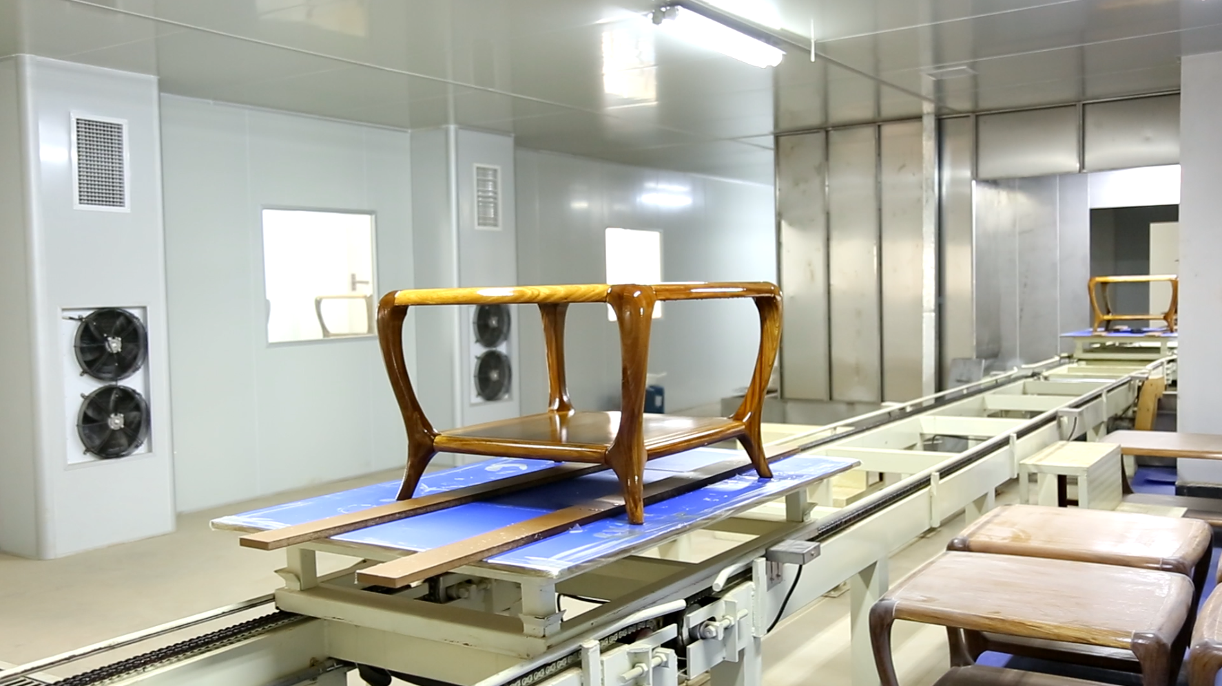 Skid conveyor system for coating line material handling