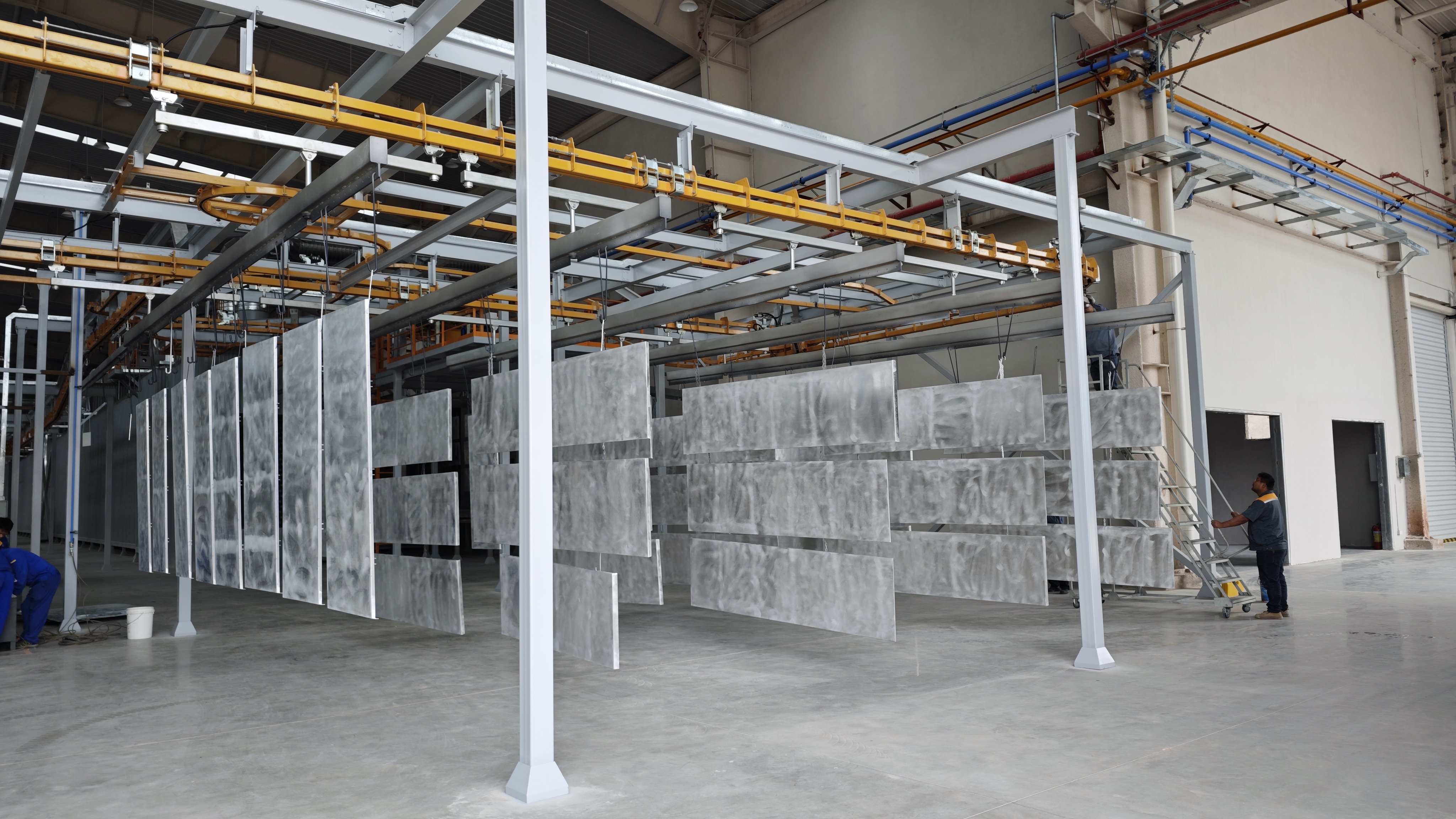 Aluminum sheet coating line in operation at a manufacturing facility