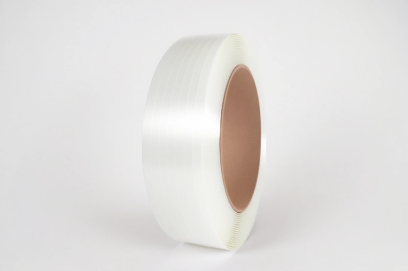 Transparent clear PET strapping keeping barcodes and labels readable through the strap