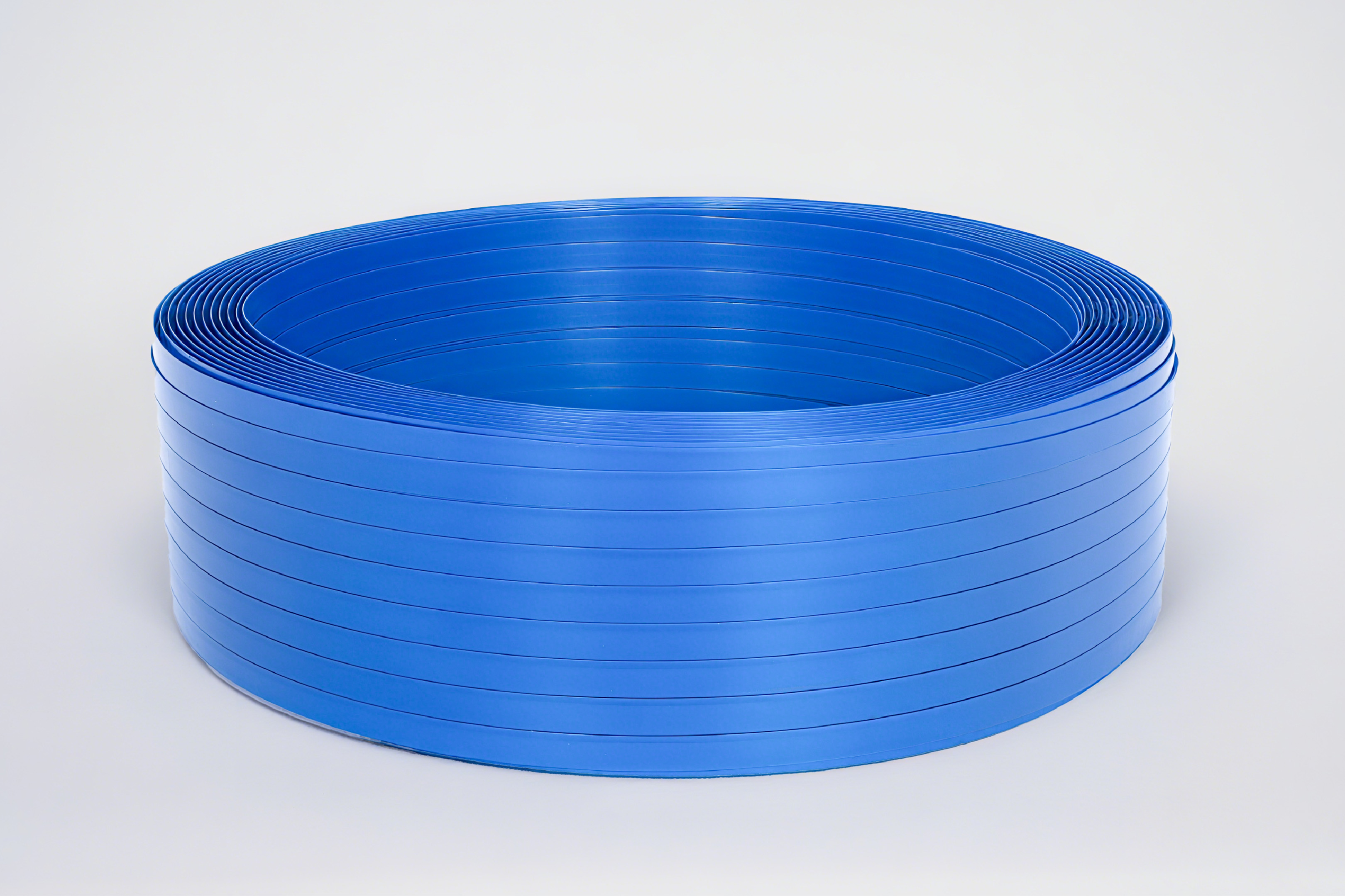 High tensile PET strapping with low elongation for heavy industrial loads