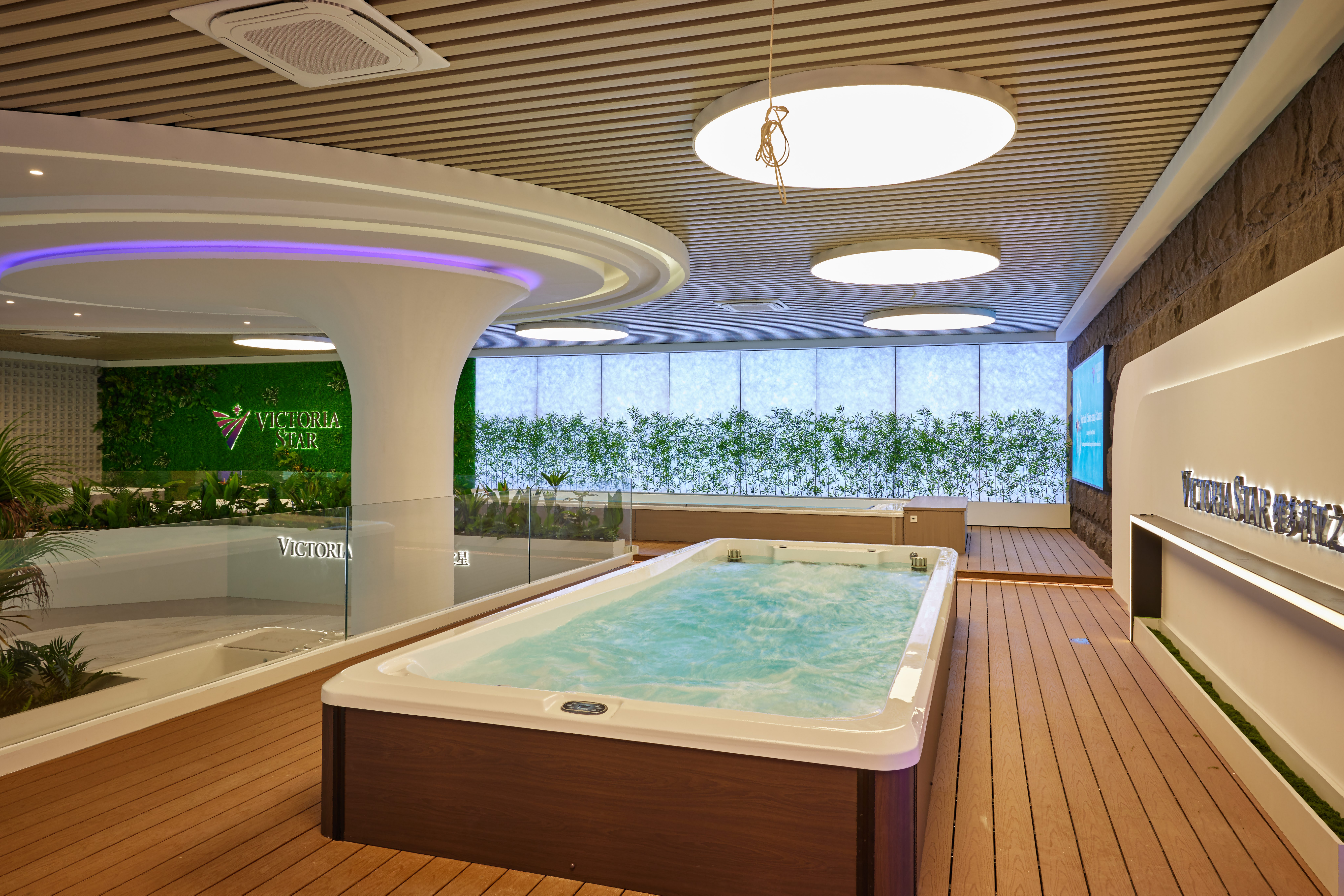 Semi-inground hot tub installation by Victoria Star for luxury villa project