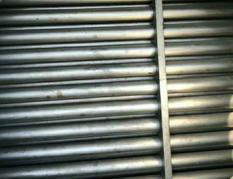 Smooth 316L stainless steel tubes in SFC condenser dryer, corrosion-free after years of service