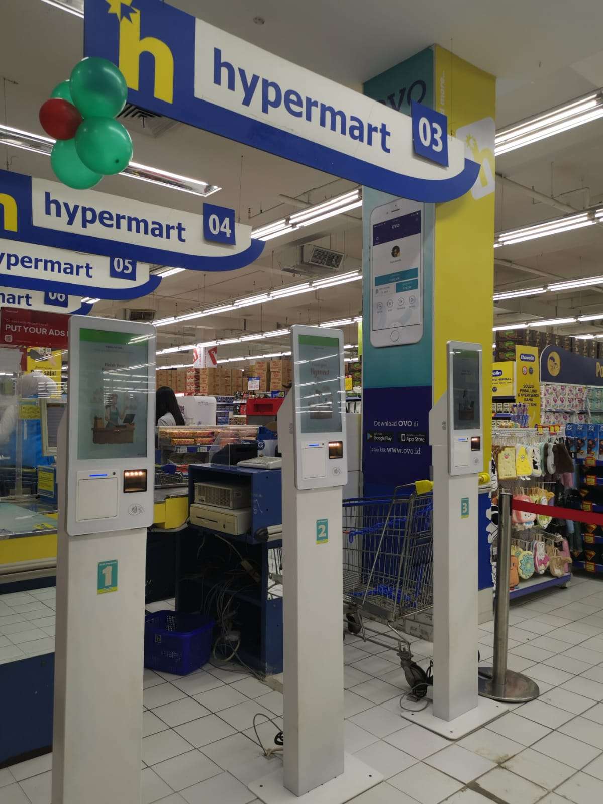 Telpo K10 self-checkout kiosk in a supermarket deployment